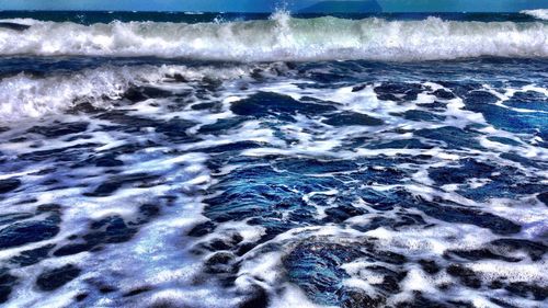 Waves splashing on rocks