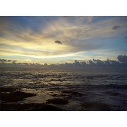 Scenic view of sea at sunset