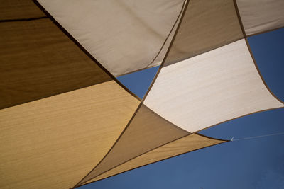 Low angle view of building against blue sky