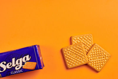 High angle view of yellow and orange on table