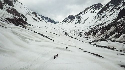 Scenic view of snowcapped mountain against sky