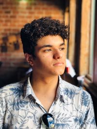 Close-up of young man looking away