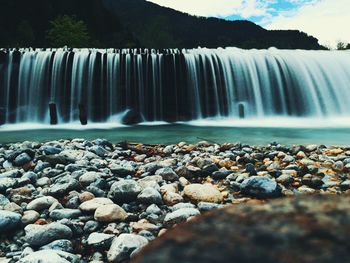 Scenic view of waterfall in forest