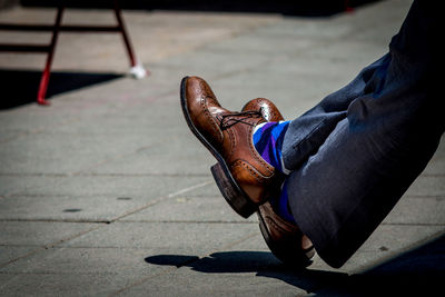 Low section of man on street