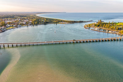 High angle view of bridge over sea against sky