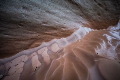 Close-up of water flowing through rocks