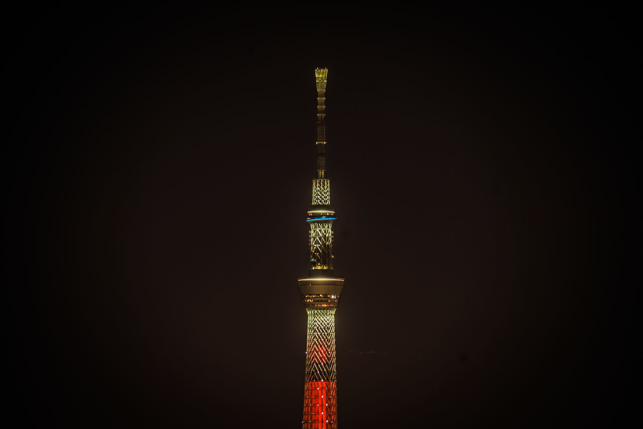 ILLUMINATED TOWER AT NIGHT