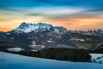 Scenic view of snowcapped mountain against sky during winter