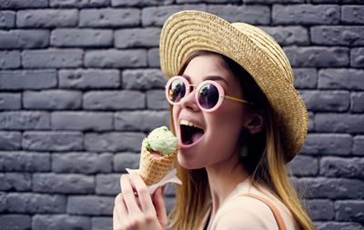 Portrait of man holding ice cream