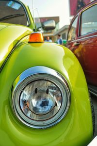 Close-up of vintage car in city