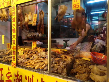 Man working at market stall