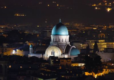 View of city lit up at night