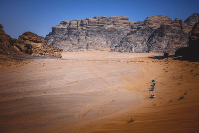 Column of 4x4 cars in the wadi rum desert. jordan