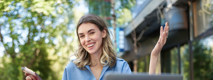 Young woman using mobile phone