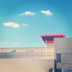 Low angle view of building against blue sky