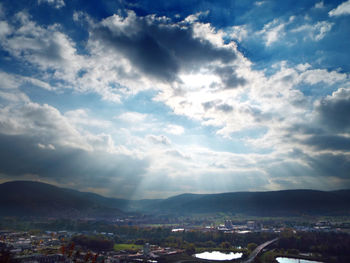 Aerial view of cityscape against sky