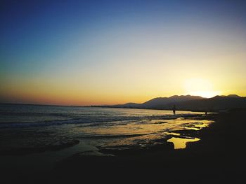 Scenic view of sea during sunset