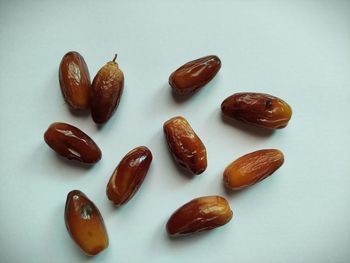 High angle view of fruits over white background