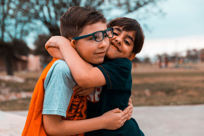 Mother and son and daughter outdoors