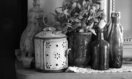 Close-up of vases on table