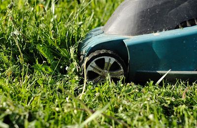 Close-up of toy car on field