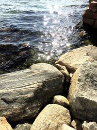 Close-up of rocks by sea