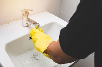 High angle view of woman in bathroom at home