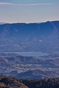 Aerial view of landscape against cloudy sky