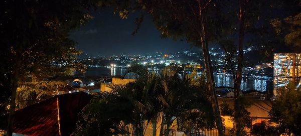 High angle view of illuminated buildings at night