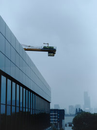 Low angle view of modern buildings against clear sky