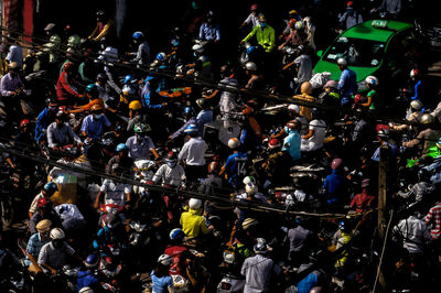 High angle view of people on street market