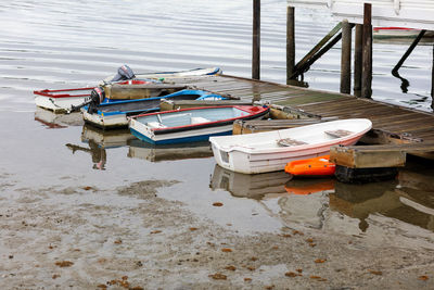 Boats moored at harbor