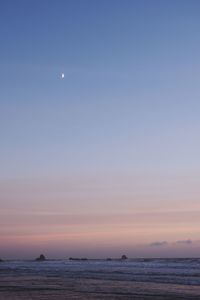 Scenic view of calm sea at dusk