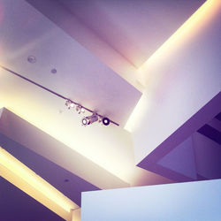 Low angle view of illuminated ceiling