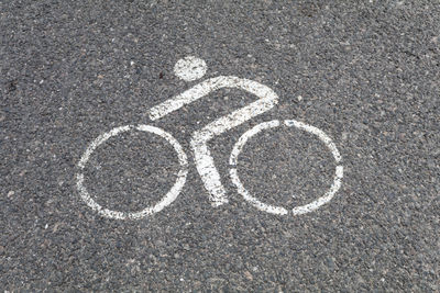 High angle view of bicycle symbol on street