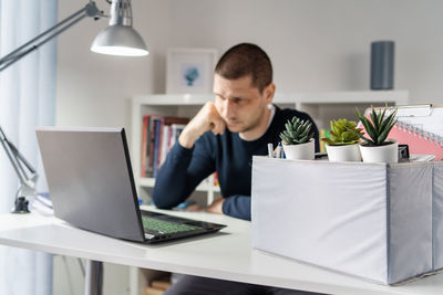 Young man using laptop