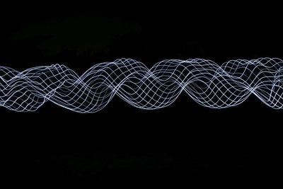 Abstract image of light painting against black background