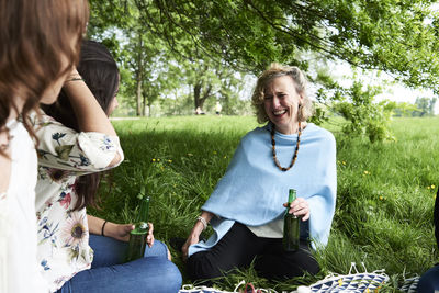 Women having fun at a picnic in park