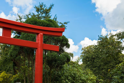 Low angle view of red built structure against sky