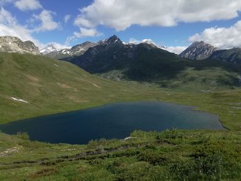 Scenic view of landscape and mountains against sky