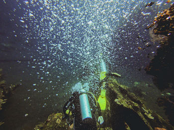 High angle view of person swimming in sea