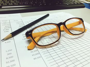 Close-up of sunglasses on table