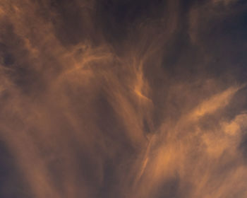 Low angle view of dramatic sky during sunset