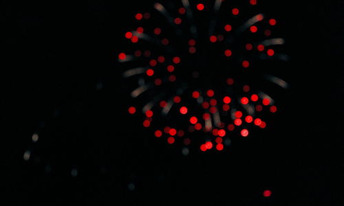 Close-up of red light against white background