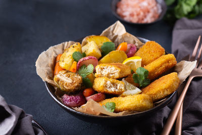 Close-up of food in plate on table