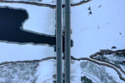 High angle view of snow covered car window