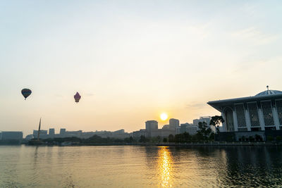 View of buildings against sky during sunset