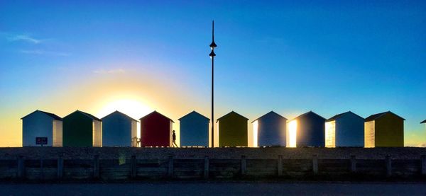 Built structure on beach against sky