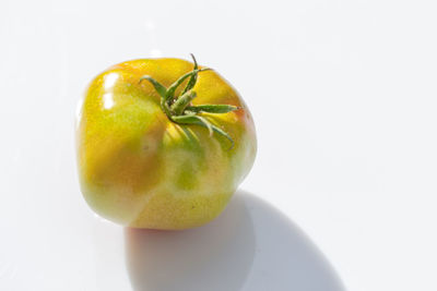 Close-up of fruits against white background