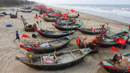 High angle view of boats moored on beach